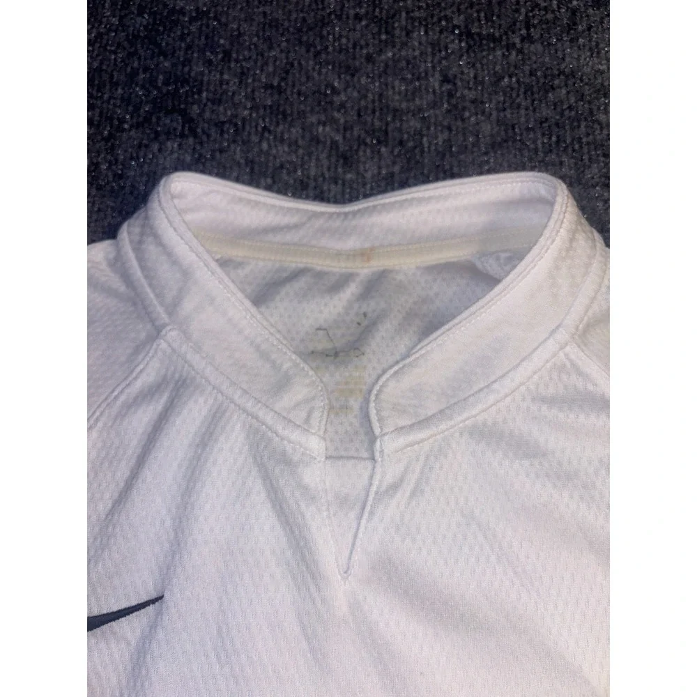 Nike Jersey Womens S/M White Mesh Stretch Embroidered Logo High Low Split V Neck